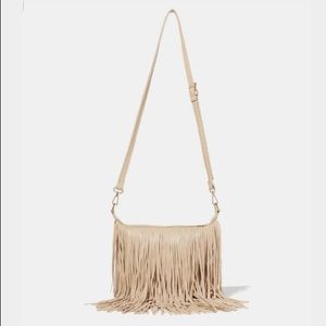Charming Charlie’s fringe body cross bag